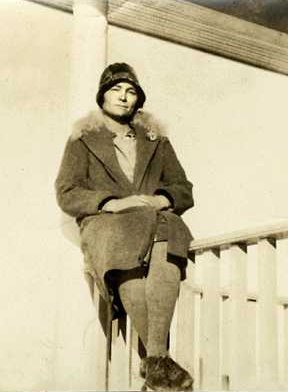 Mary on porch railing
